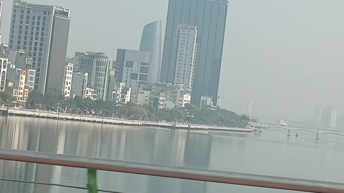 City skyline across a calm bay