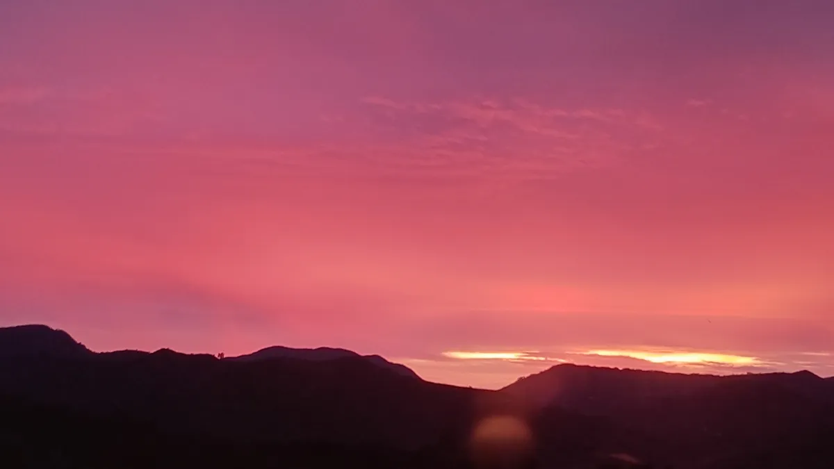 Pink and orange sunset over mountains